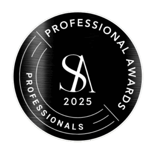 Black circular Professional Awards 2025 seal with stylized SA logo and Professionals ring text