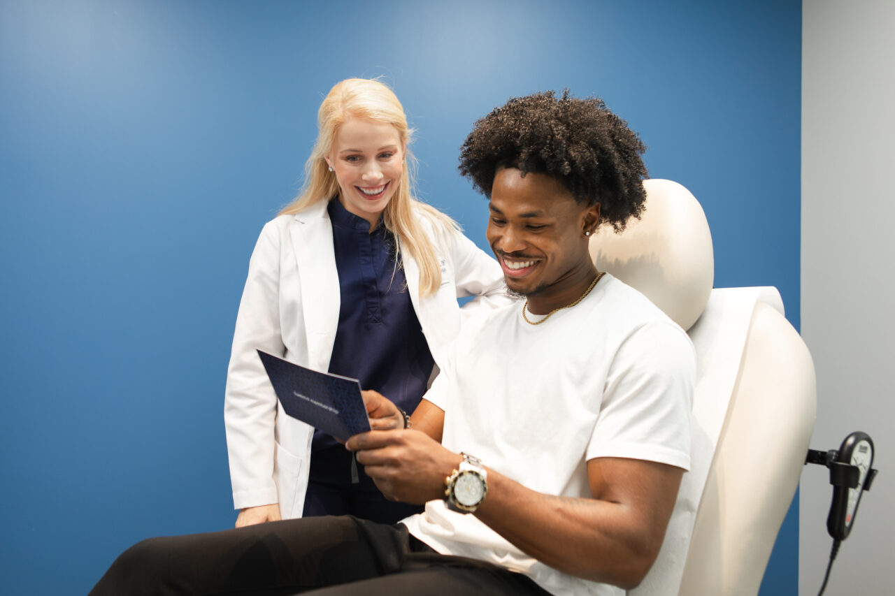 Skin Wellness provider with patient