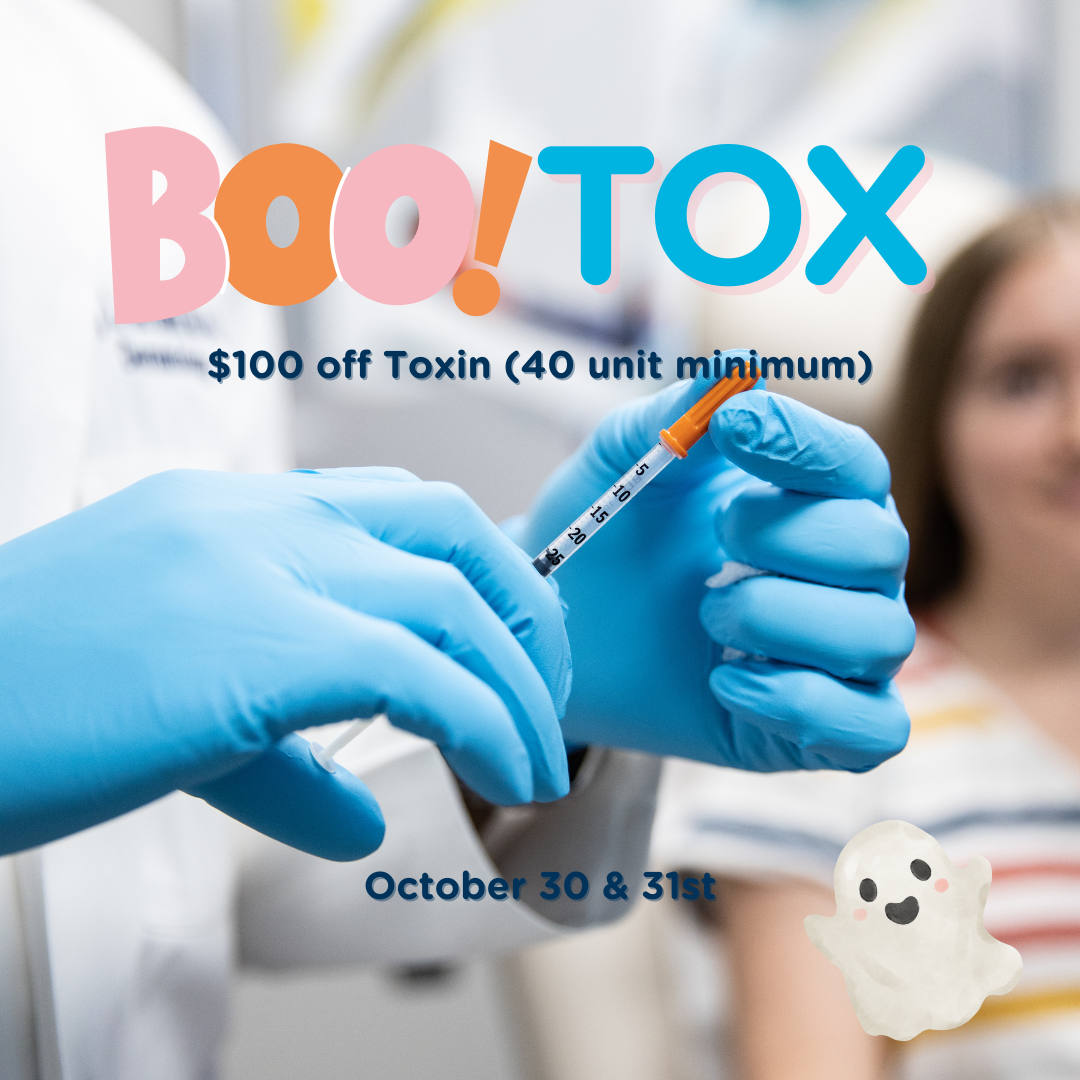 Clinician in blue gloves holding Botox syringe preparing to inject a patient, Halloween toxin special in Birmingham