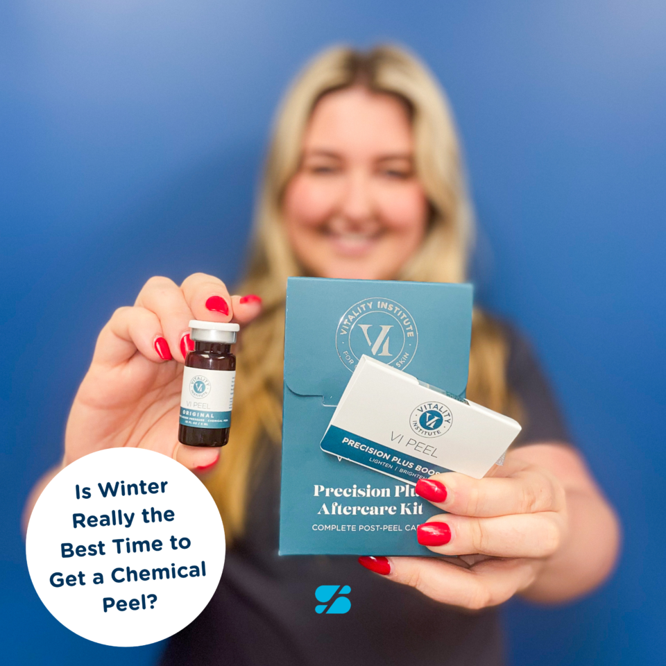 A woman holding a VI Peel vial and teal Precision Plus Boost aftercare kit for chemical peel skincare.