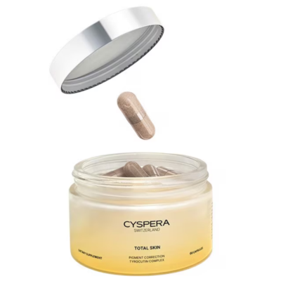 Cyspera Total Skin pigment correction capsules jar with one capsule dropping for skin brightening