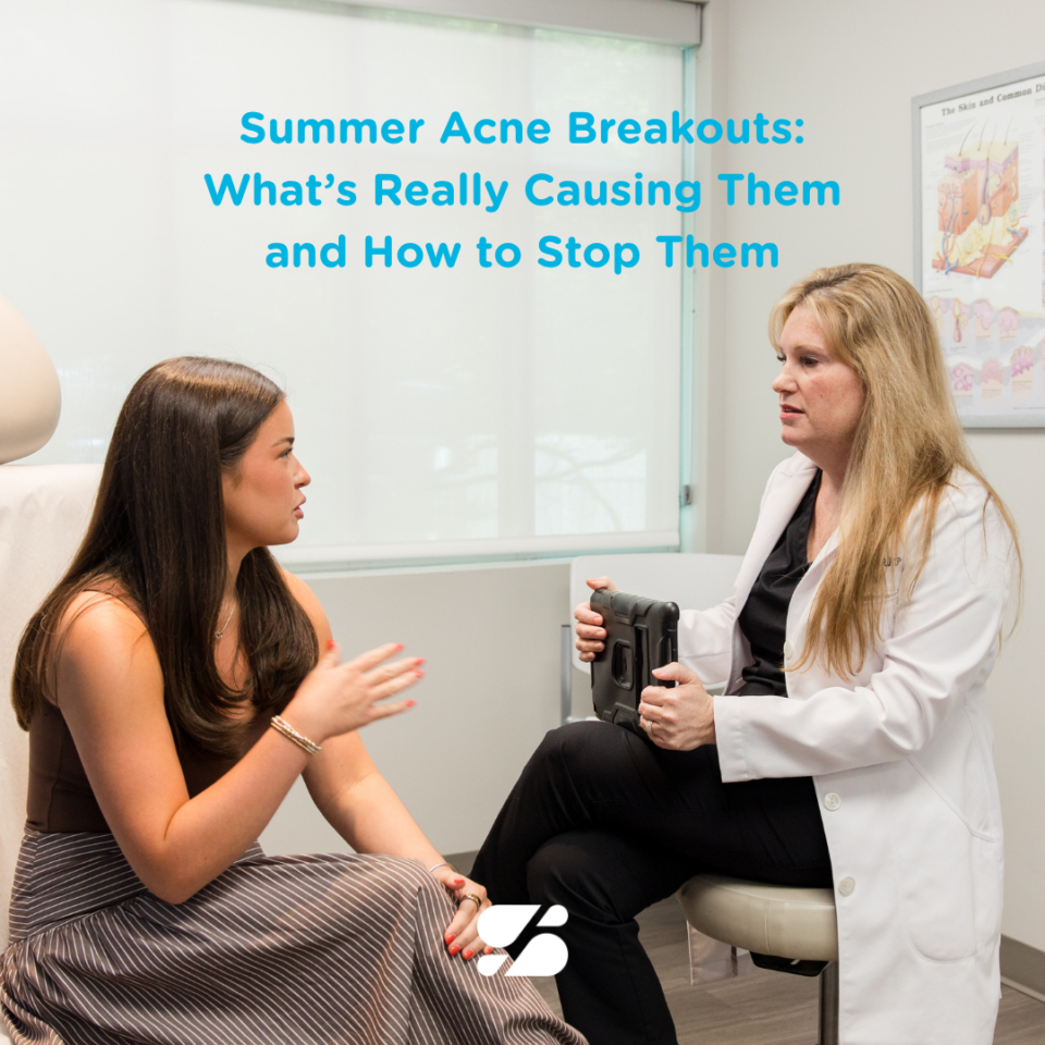 Dermatologist consulting a patient about summer acne treatments in a Birmingham skin clinic